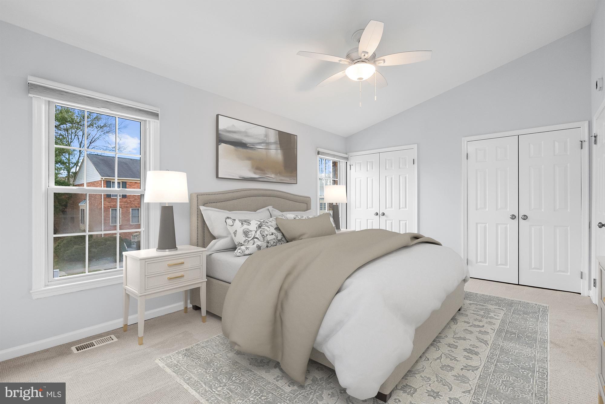 5465 Grove Ridge Way, Unit 123 Rockville, MD 20852 - Photo 18 of 39 a spacious bedroom with a large bed and a window