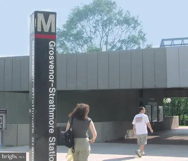 a front view of a house with entryway and wooden floor