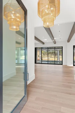 a large bathroom with a large tub and double vanity