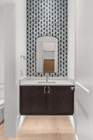 a bathroom with a bathtub and shower