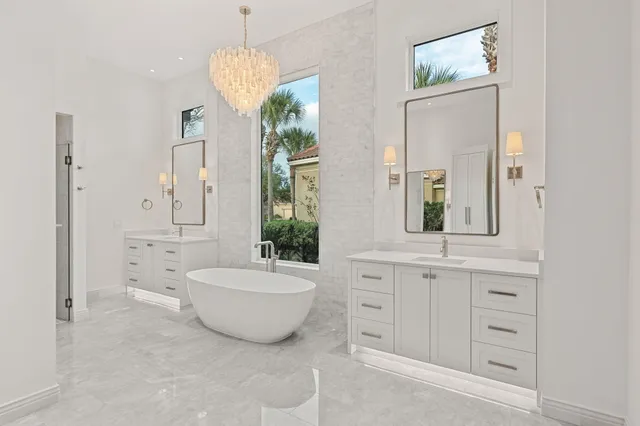 an aerial view of a house with a ocean view