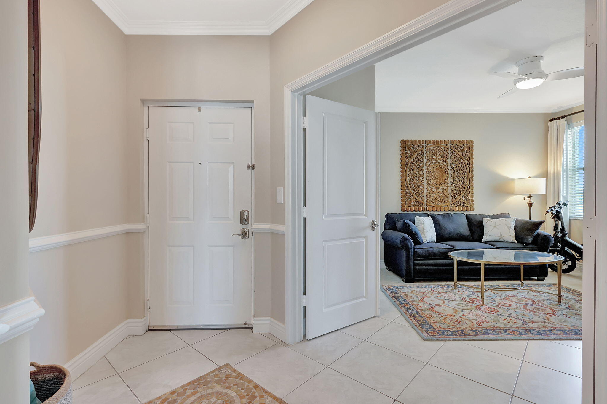 775 Northwest Flagler Avenue, Unit 401 Stuart, FL 34994 - Photo 8 of 56 a view of a livingroom with furniture and window
