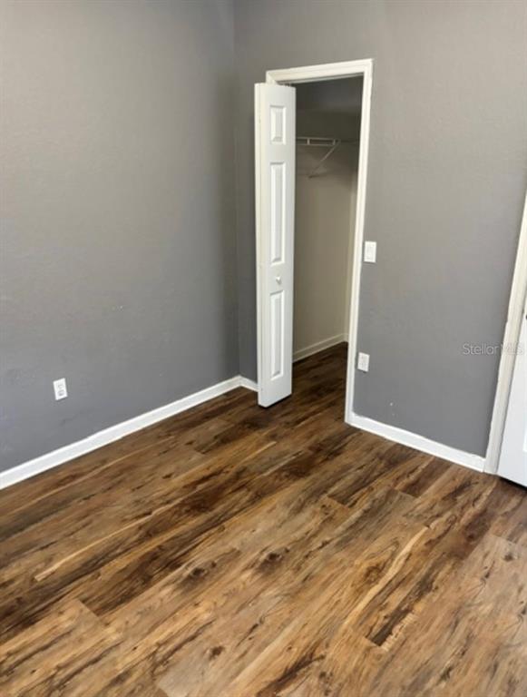 3489 Allegra Circle St. Cloud, FL 34772 - Photo 16 of 29 a view of room with wooden floor