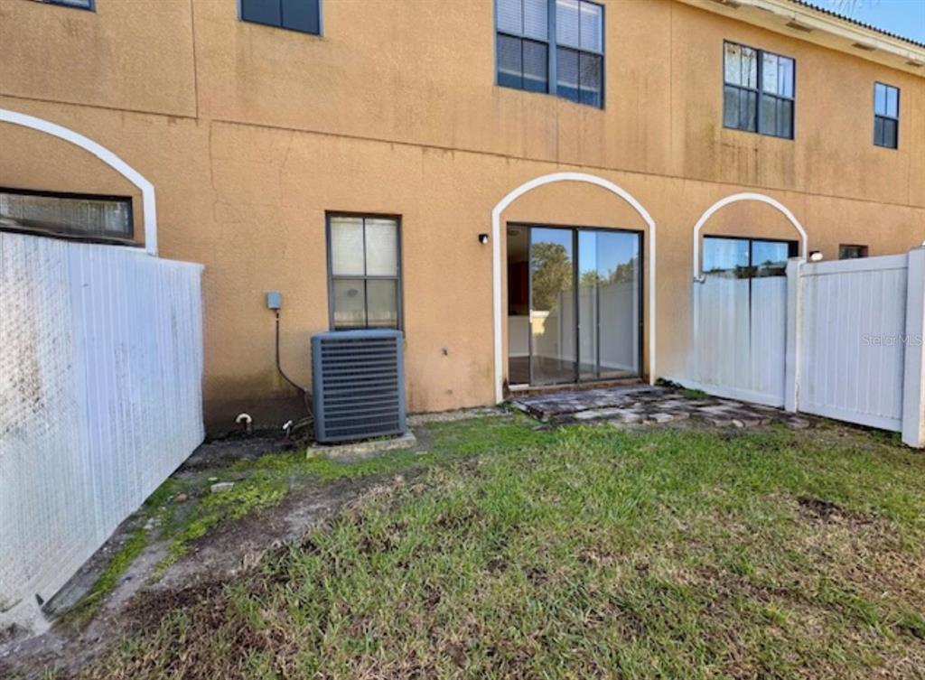 3489 Allegra Circle St. Cloud, FL 34772 - Photo 22 of 29 a front view of house with yard