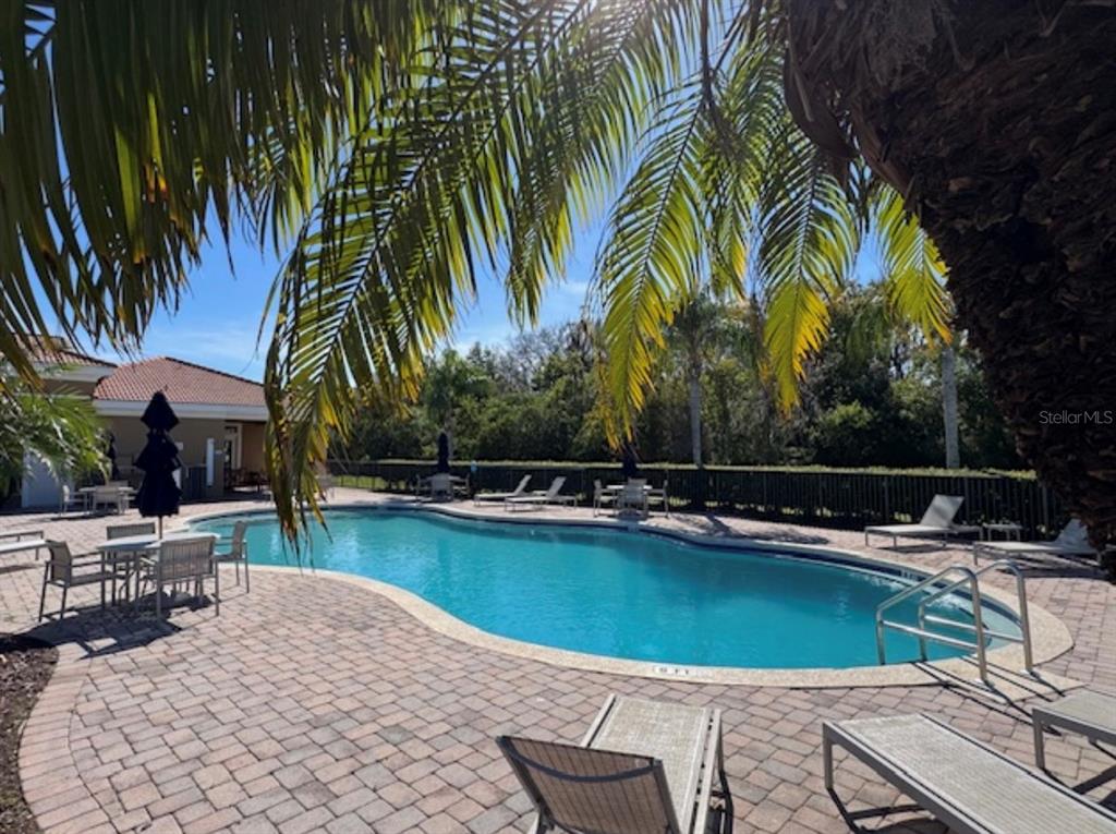3489 Allegra Circle St. Cloud, FL 34772 - Photo 26 of 29 a view of outdoor space yard and swimming pool