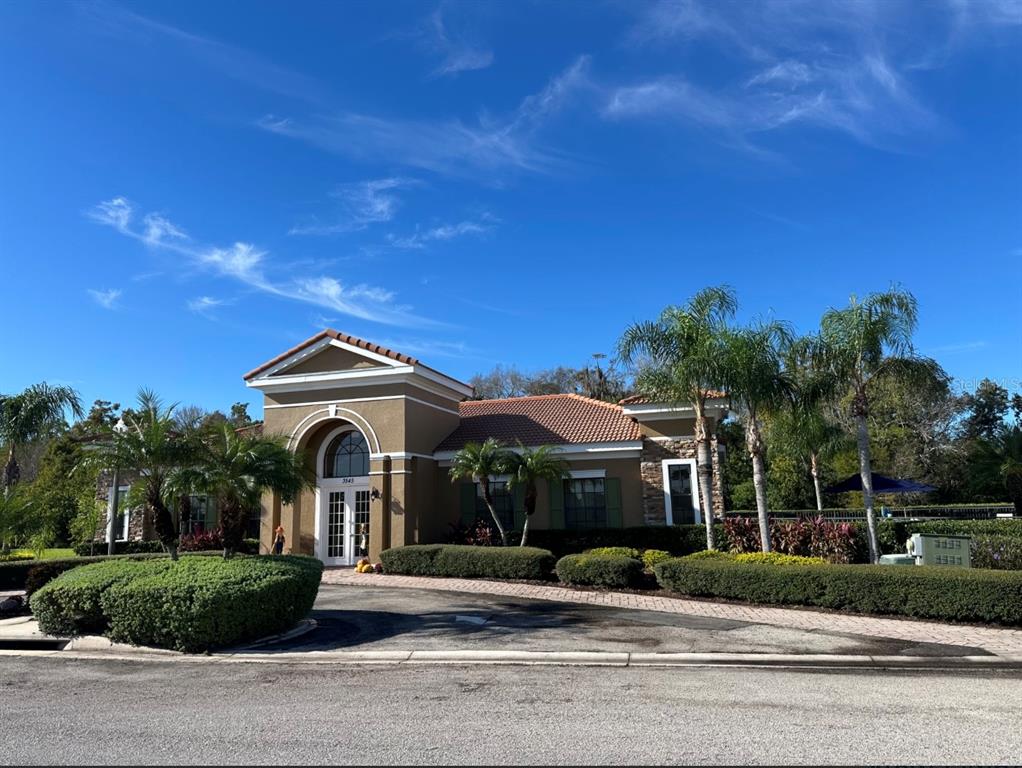 3489 Allegra Circle St. Cloud, FL 34772 - Photo 28 of 29 a front view of a house with a yard