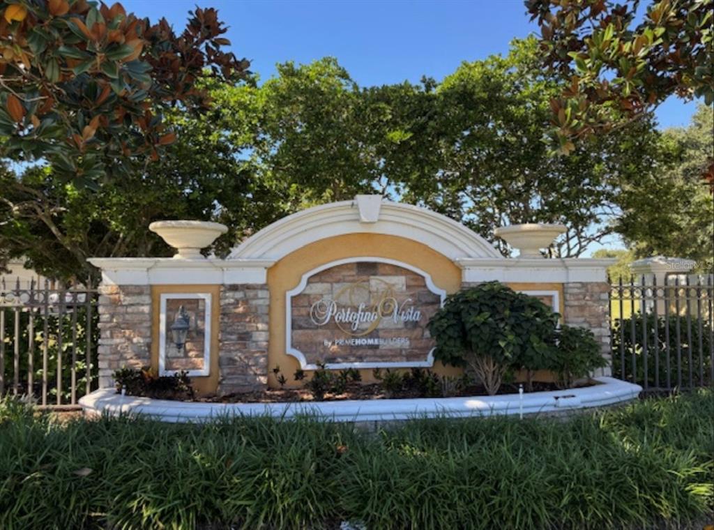 3489 Allegra Circle St. Cloud, FL 34772 - Photo 3 of 29 a front view of a house with a garden