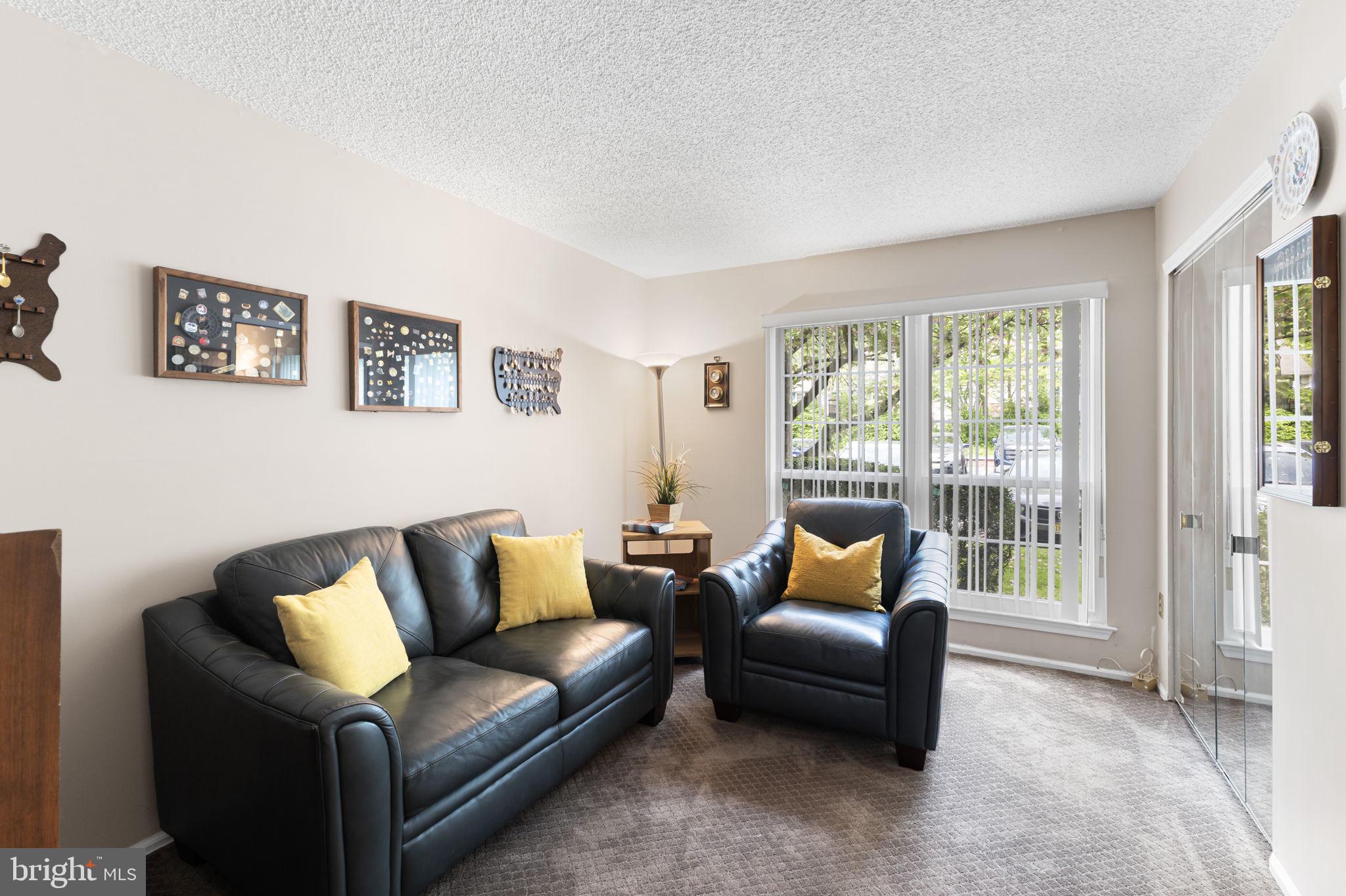 14 Cheverny Court Hamilton, NJ 08619 - Photo 13 of 25 a living room with furniture and a large window