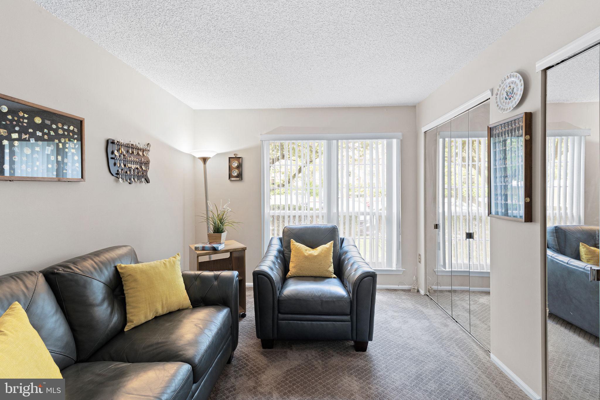 14 Cheverny Court Hamilton, NJ 08619 - Photo 14 of 25 a living room with furniture and a large window