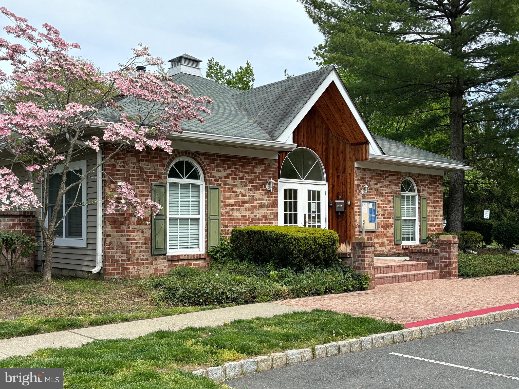 14 Cheverny Court Hamilton, NJ 08619 - Photo 21 of 25 a front view of a house with garden