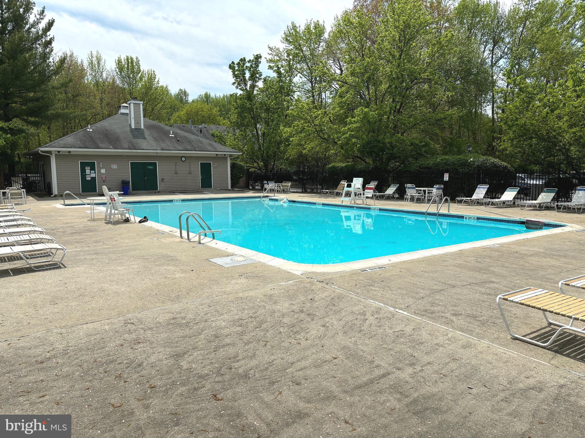 14 Cheverny Court Hamilton, NJ 08619 - Photo 23 of 25 a view of a house with a yard and sitting area