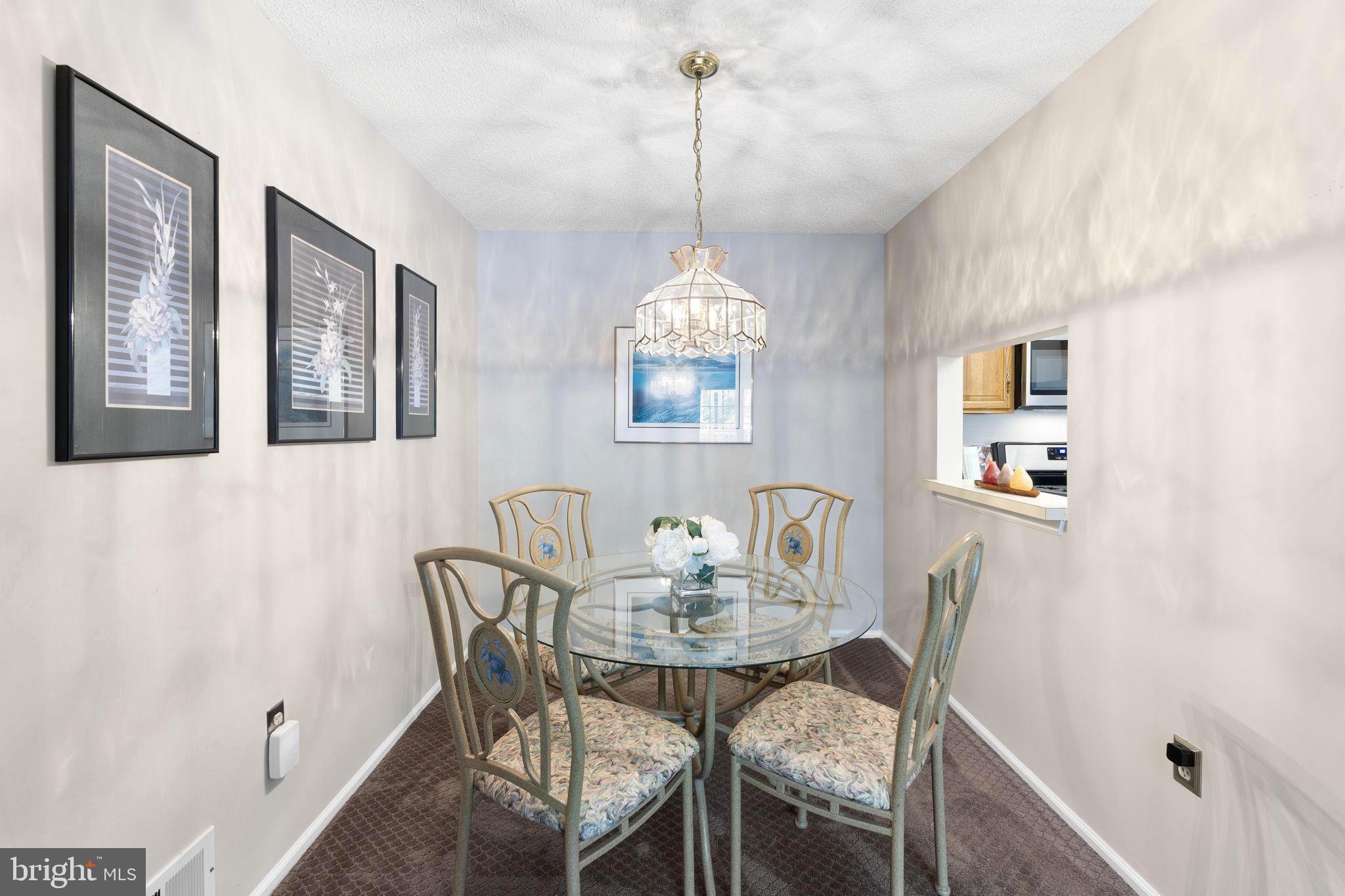 14 Cheverny Court Hamilton, NJ 08619 - Photo 6 of 25 a view of a dining room with furniture window and wooden floor