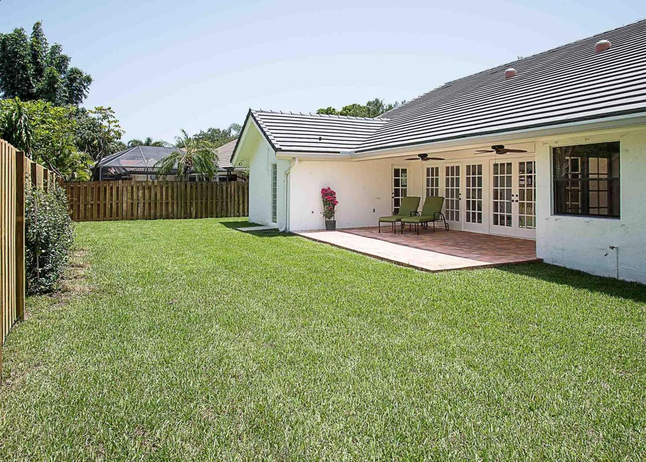 2695 Northwest 41st Street Boca Raton, FL 33434 - Photo 17 of 26 Fenced Backyard