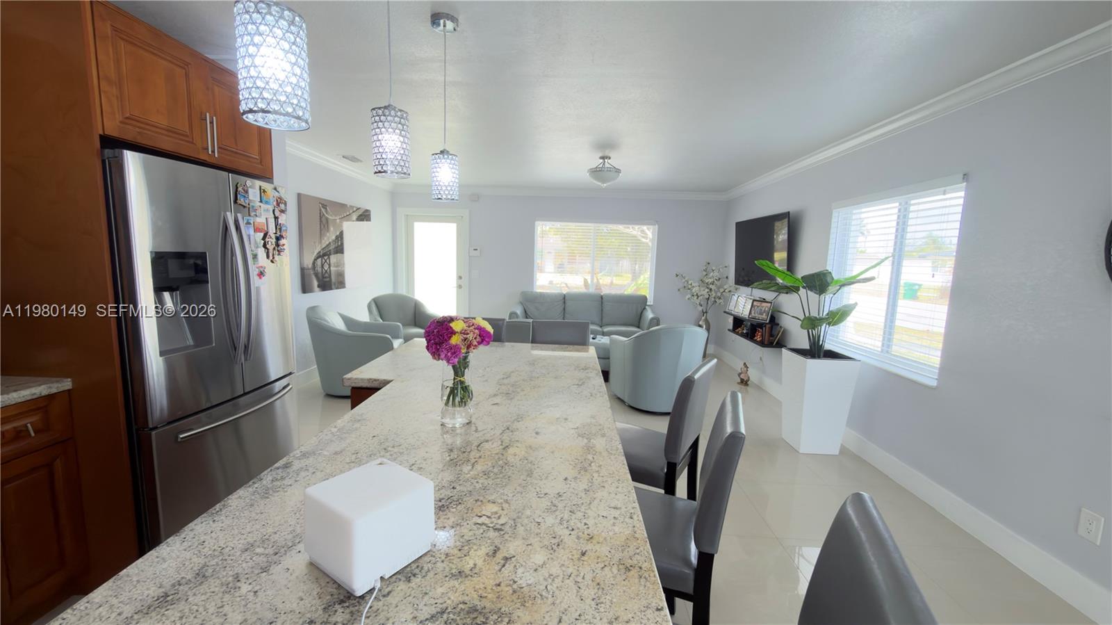 30001 Southwest 153rd Avenue Homestead, FL 33033 - Photo 11 of 55 a kitchen with refrigerator and window