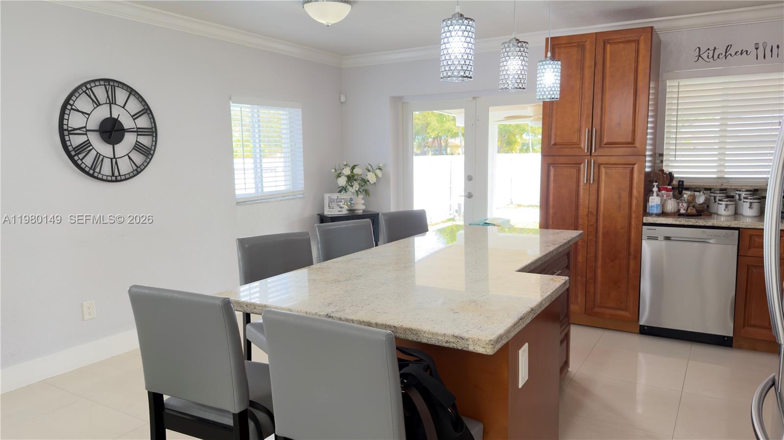 30001 Southwest 153rd Avenue Homestead, FL 33033 - Photo 19 of 55 a dining room with furniture and window