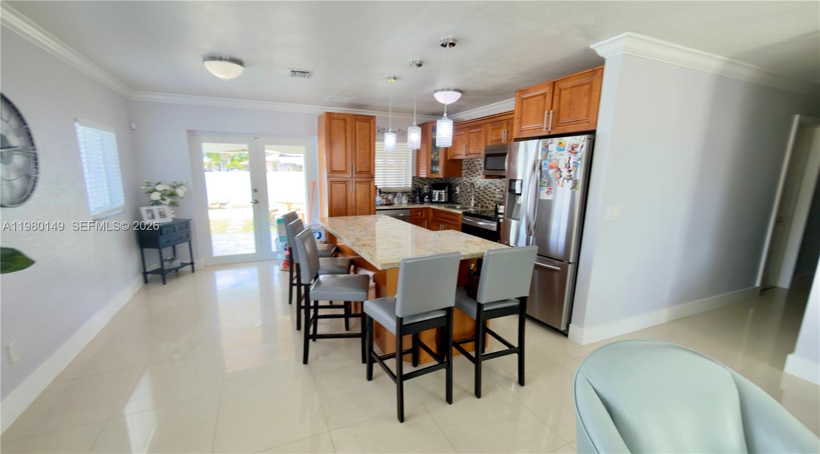 30001 Southwest 153rd Avenue Homestead, FL 33033 - Photo 20 of 55 a dining room with furniture and window