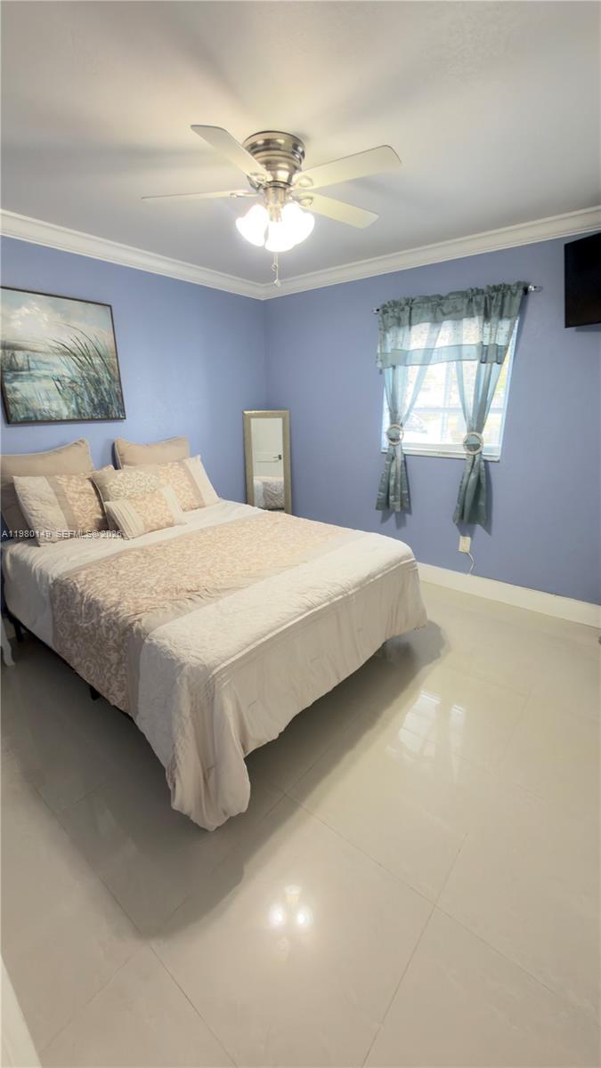 30001 Southwest 153rd Avenue Homestead, FL 33033 - Photo 22 of 55 a bedroom with a bed and window