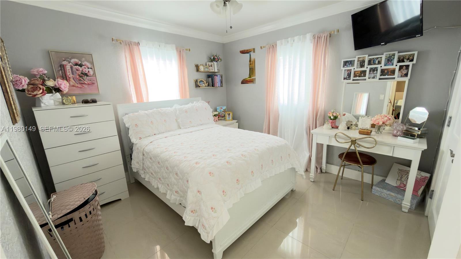 30001 Southwest 153rd Avenue Homestead, FL 33033 - Photo 26 of 55 a bedroom with a bed and flat screen tv