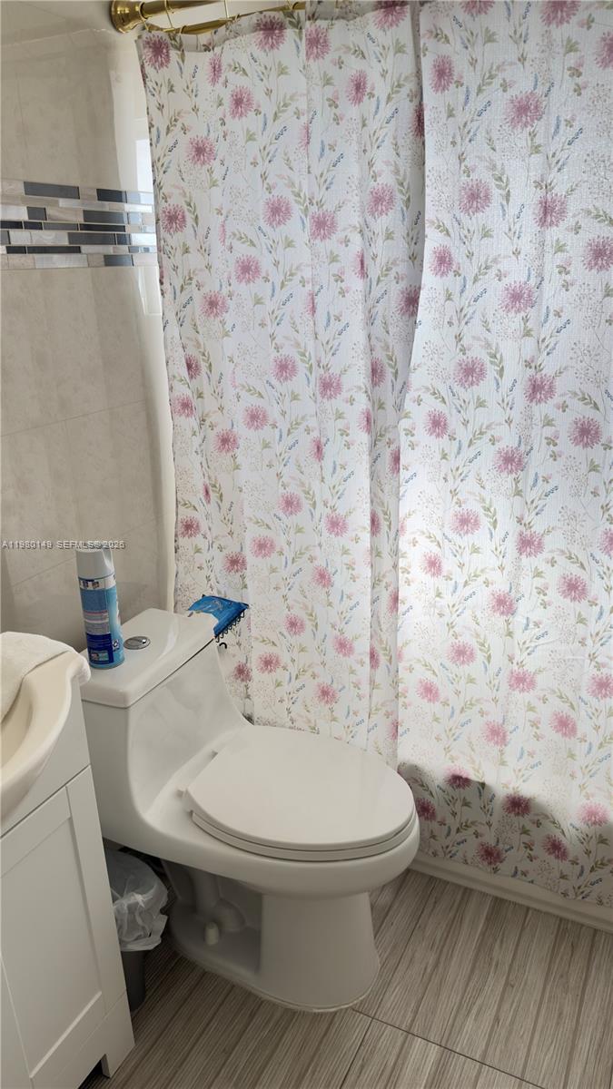 30001 Southwest 153rd Avenue Homestead, FL 33033 - Photo 29 of 55 a bathroom with a toilet and a shower
