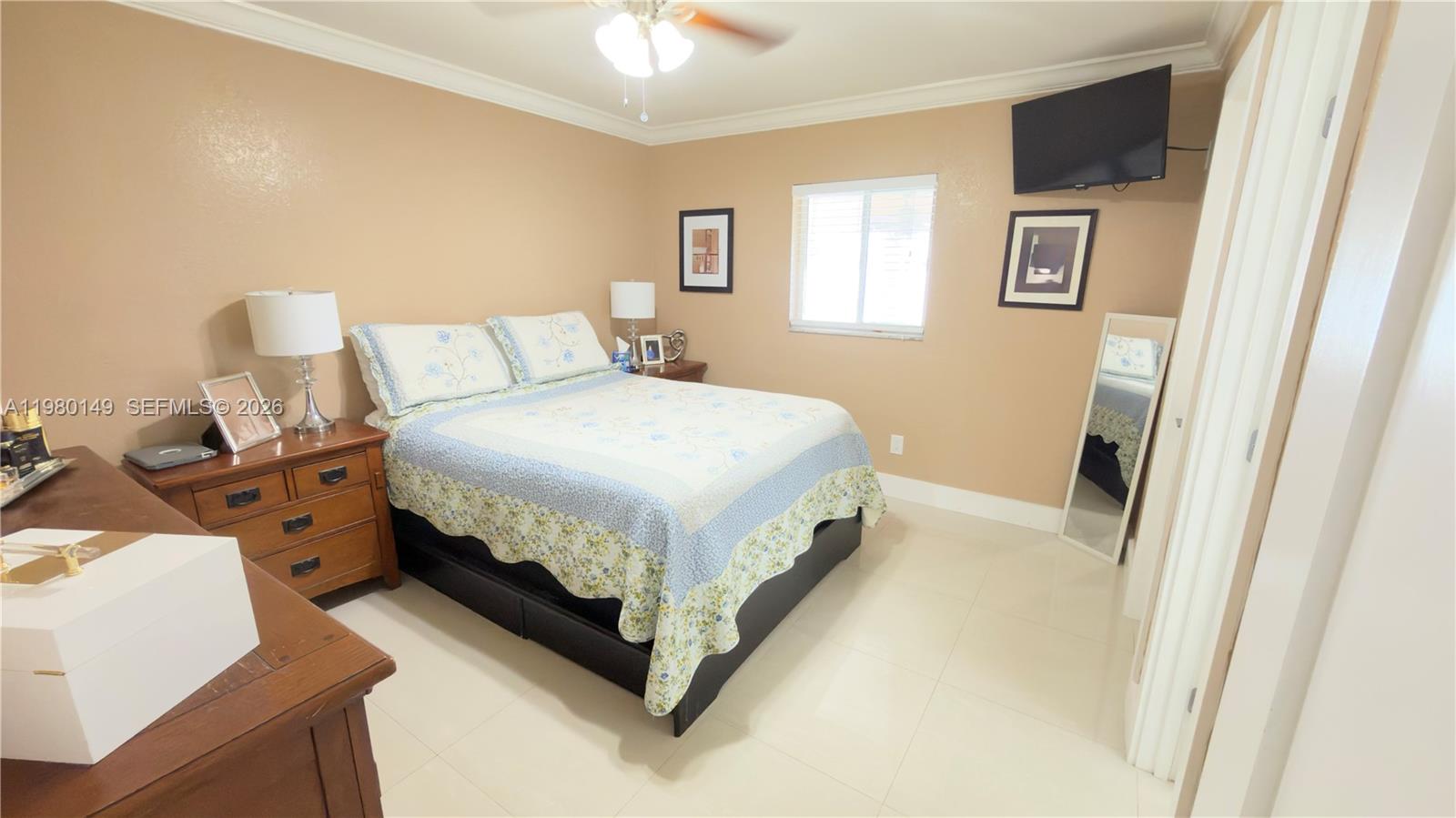 30001 Southwest 153rd Avenue Homestead, FL 33033 - Photo 31 of 55 a bedroom with a bed and a night stand