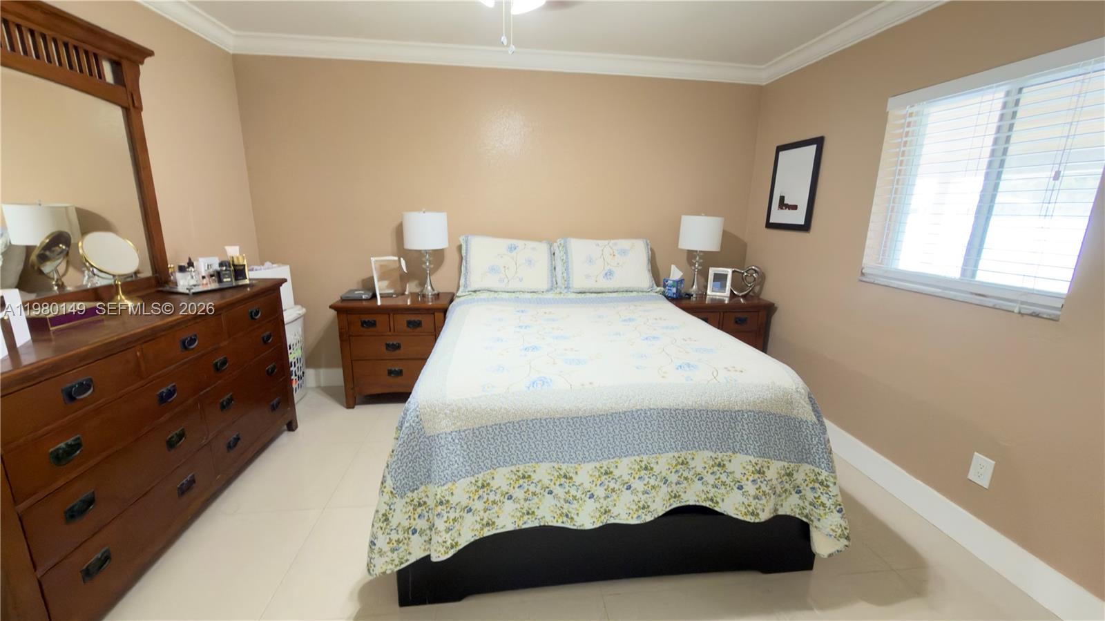 30001 Southwest 153rd Avenue Homestead, FL 33033 - Photo 33 of 55 a bedroom with a bed and a flat tv screen on dresser