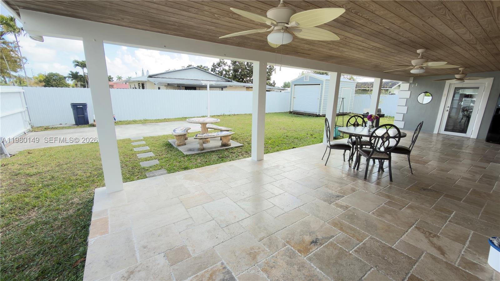 30001 Southwest 153rd Avenue Homestead, FL 33033 - Photo 36 of 55 a balcony with furniture and garden view