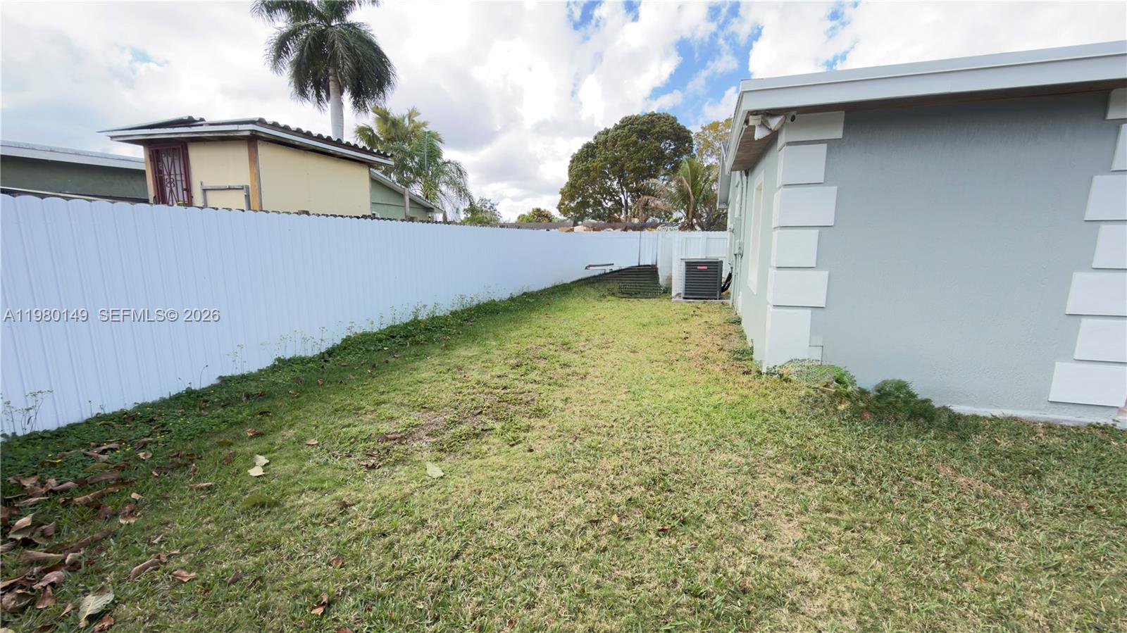 30001 Southwest 153rd Avenue Homestead, FL 33033 - Photo 42 of 55 a view of white house with a yard