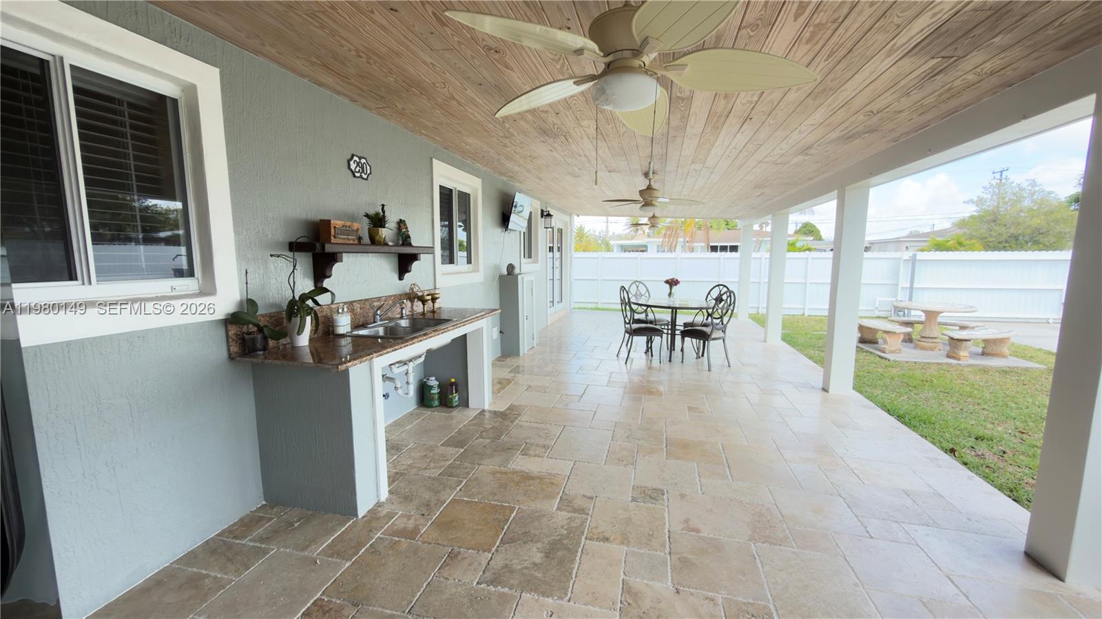 30001 Southwest 153rd Avenue Homestead, FL 33033 - Photo 46 of 55 a view of a patio with table and chairs