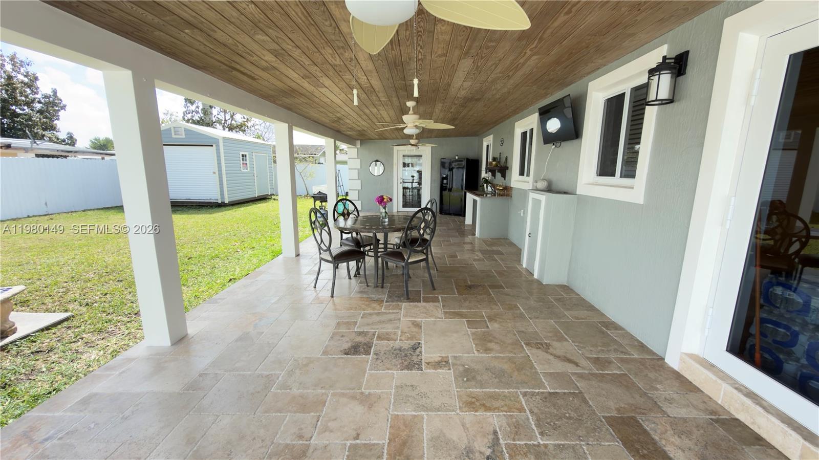 30001 Southwest 153rd Avenue Homestead, FL 33033 - Photo 47 of 55 a view of an dining space with furniture window and outside view