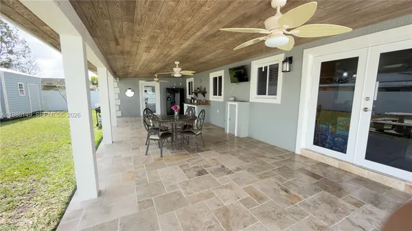 a view of storage and utility room with washer and dryer