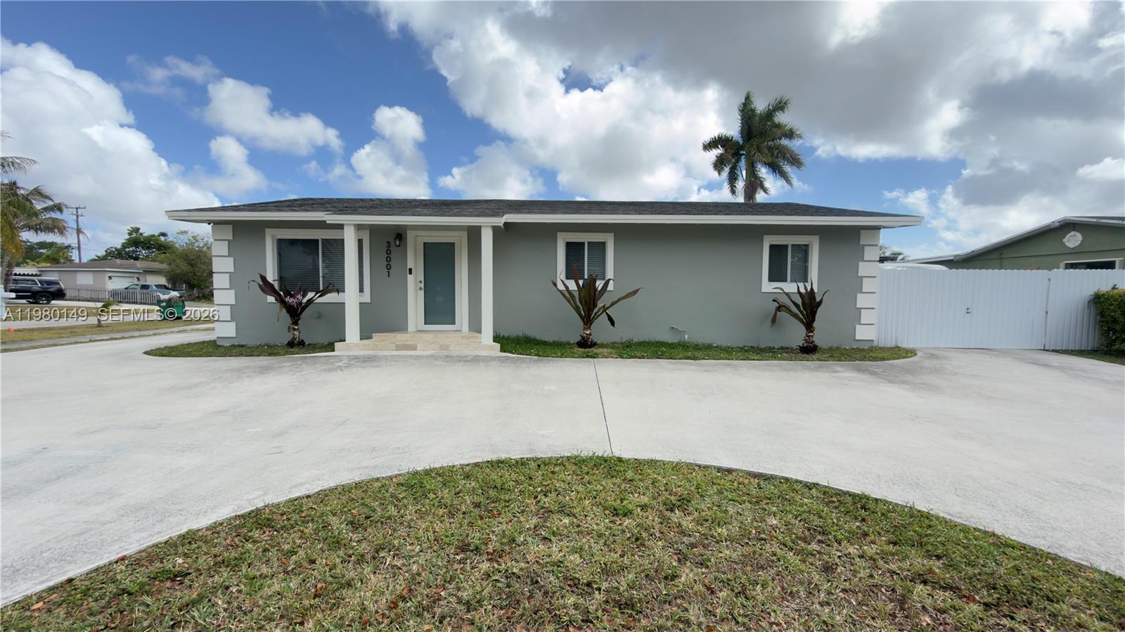30001 Southwest 153rd Avenue Homestead, FL 33033 - Photo 5 of 55 a view of a house with a outdoor space