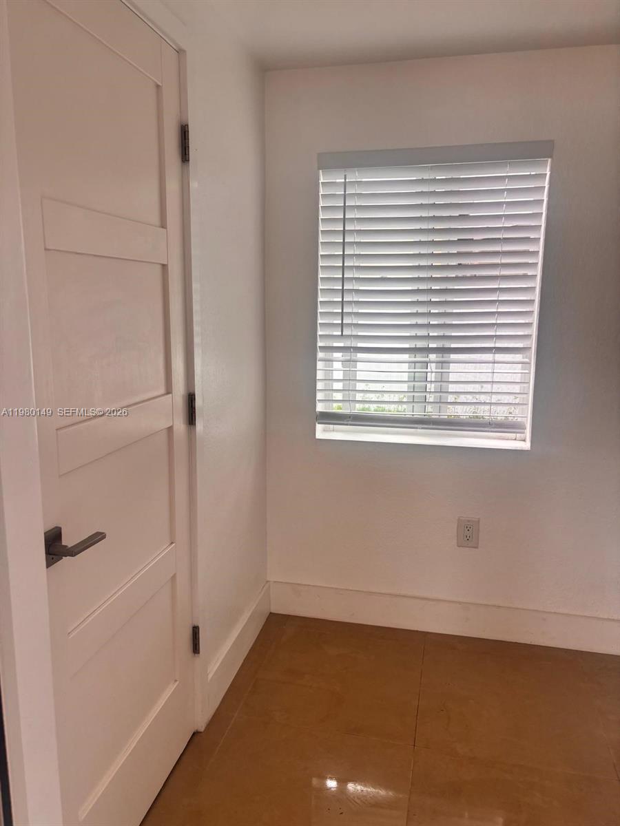 30001 Southwest 153rd Avenue Homestead, FL 33033 - Photo 54 of 55 a view of an empty room with a window
