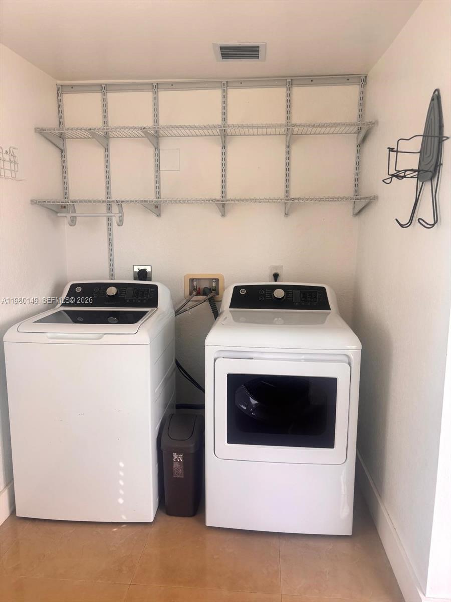 30001 Southwest 153rd Avenue Homestead, FL 33033 - Photo 55 of 55 a utility room with dryer and washer