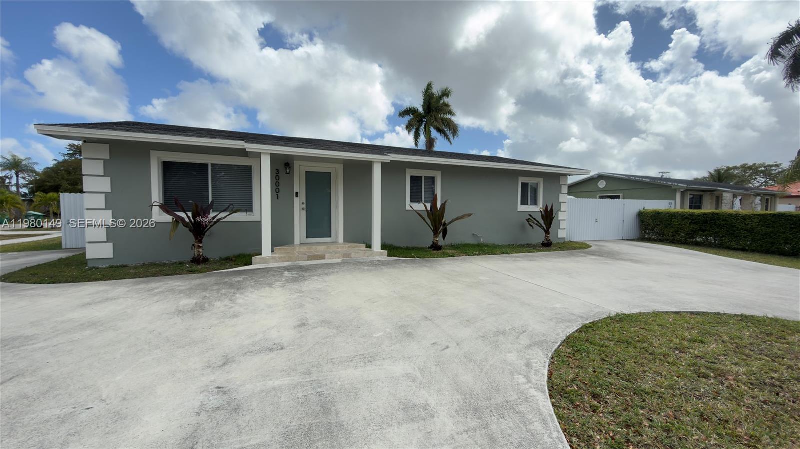 30001 Southwest 153rd Avenue Homestead, FL 33033 - Photo 6 of 55 a view of a house with a porch