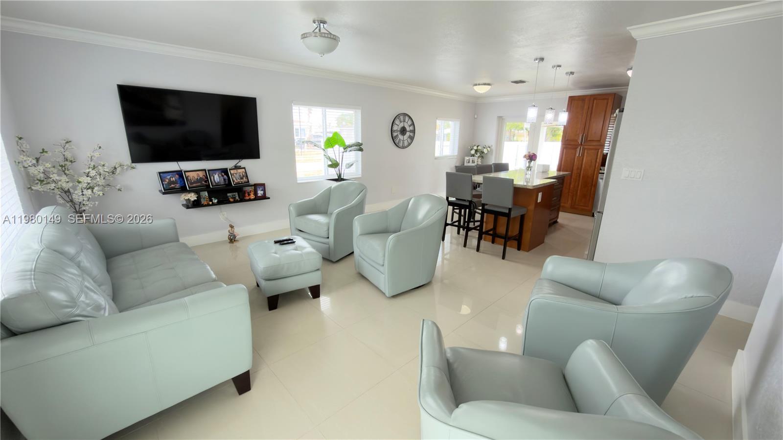 30001 Southwest 153rd Avenue Homestead, FL 33033 - Photo 10 of 55 a living room with furniture and a flat screen tv