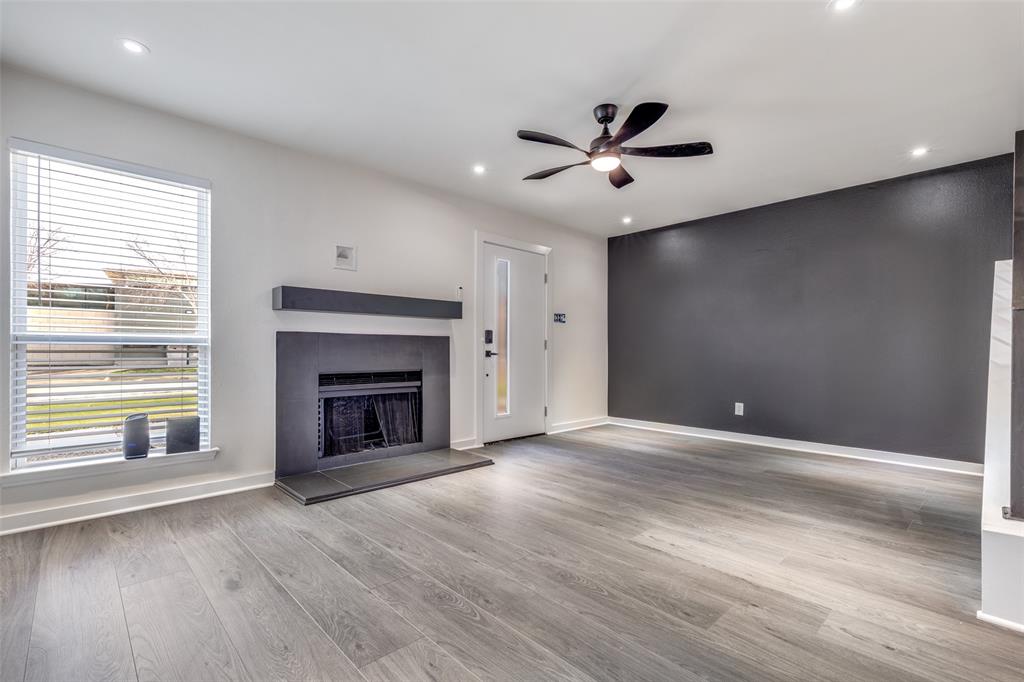2228 Colony Court Dallas, TX 75235 - Photo 4 of 14 wooden floor in an empty room with a window