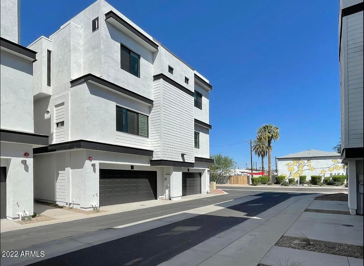 3215 East Flower Street, Unit 10 Phoenix, AZ 85018 - Photo 4 of 50 a view of a building with a street
