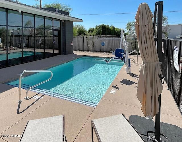 3215 East Flower Street, Unit 10 Phoenix, AZ 85018 - Photo 6 of 50 a view of a backyard with furniture