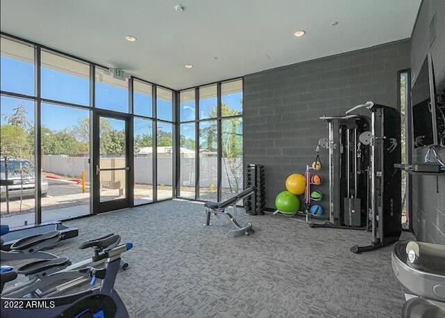 3215 East Flower Street, Unit 10 Phoenix, AZ 85018 - Photo 7 of 50 a view of a room with gym equipment