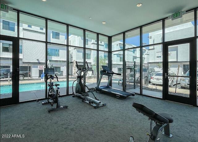 3215 East Flower Street, Unit 10 Phoenix, AZ 85018 - Photo 8 of 50 a view of a room with gym equipment