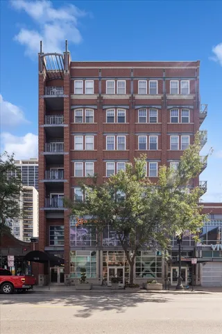 a front view of a multi story residential apartment building