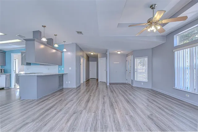 a view of an empty room and window