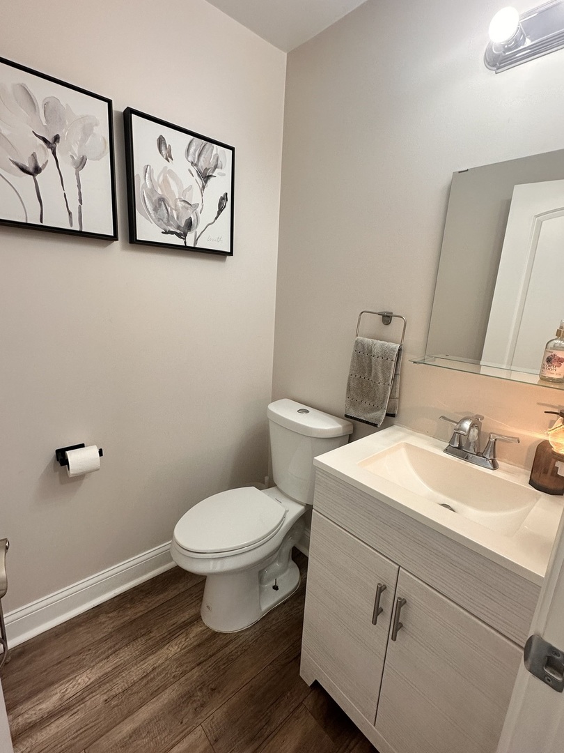 2214 Andrew Trail Montgomery, IL 60538 - Photo 11 of 28 a bathroom with a toilet sink and mirror