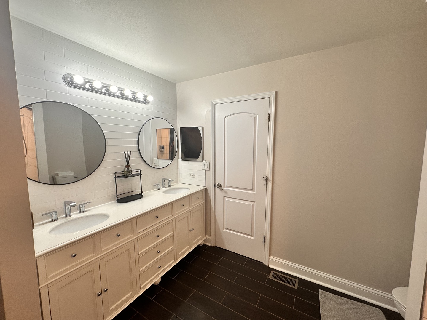 2214 Andrew Trail Montgomery, IL 60538 - Photo 16 of 28 a bathroom with a double vanity sink and a mirror