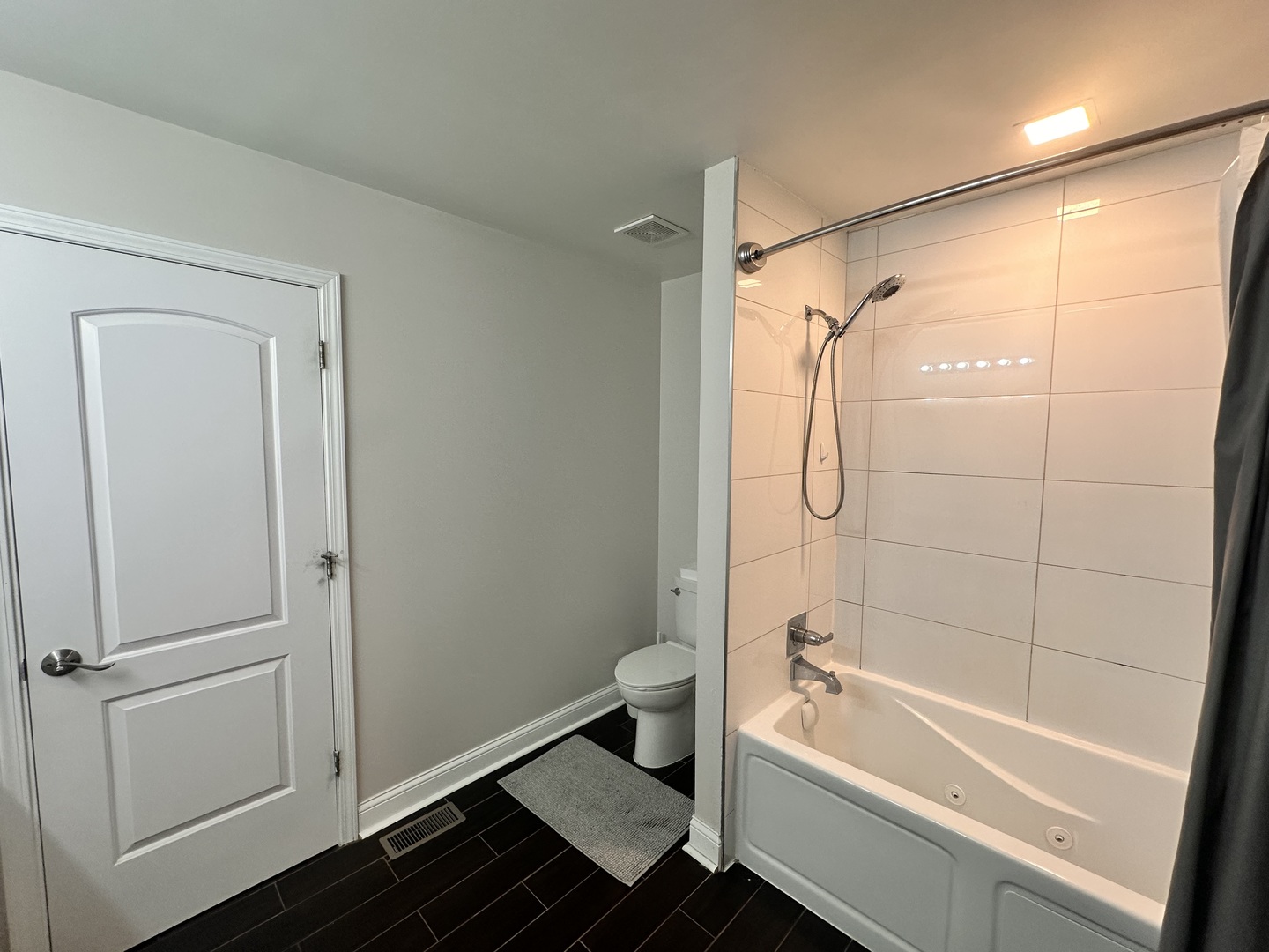 2214 Andrew Trail Montgomery, IL 60538 - Photo 17 of 28 a bathroom with a granite countertop bathtub shower and toilet