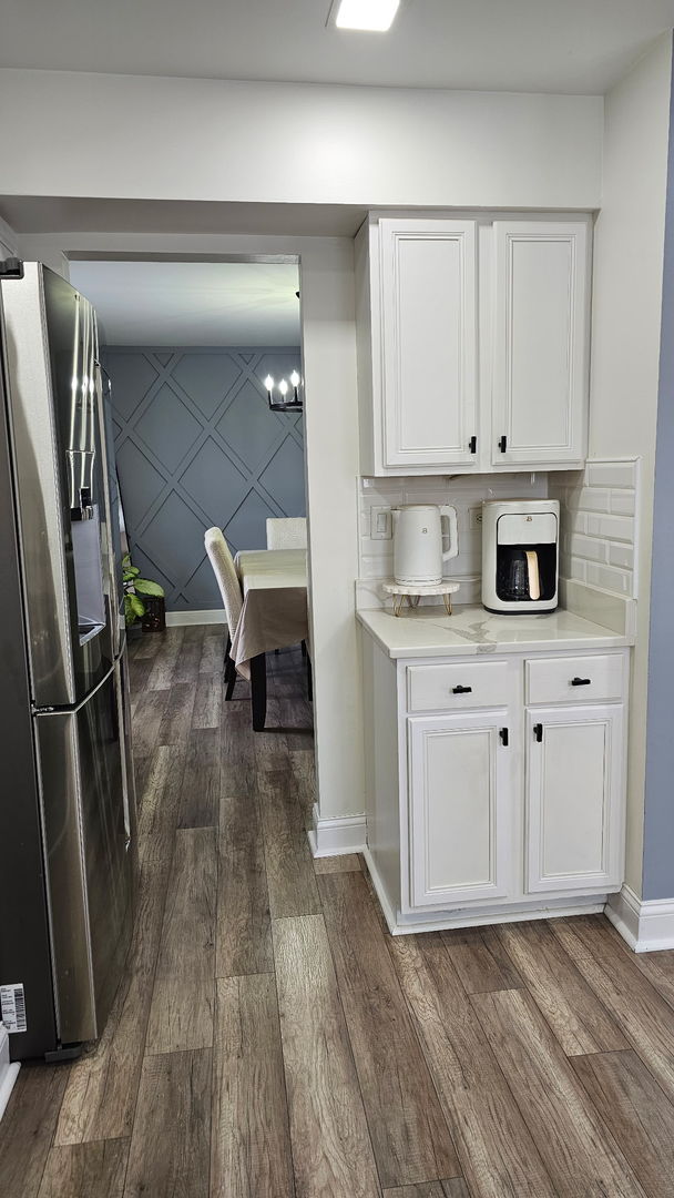 2214 Andrew Trail Montgomery, IL 60538 - Photo 10 of 28 a kitchen with stainless steel appliances a refrigerator sink and cabinets