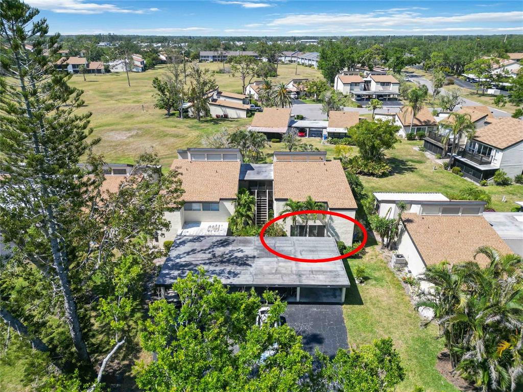 672 White Pine Tree Road, Unit 57 Venice, FL 34285 - Photo 28 of 57 an aerial view of a house with outdoor space