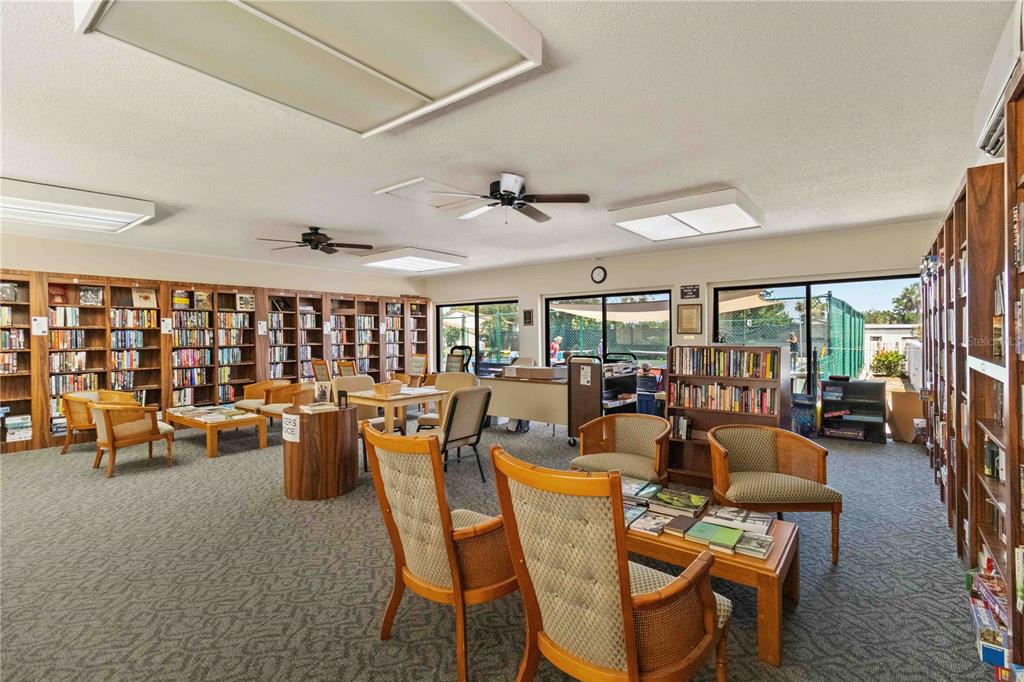 672 White Pine Tree Road, Unit 57 Venice, FL 34285 - Photo 40 of 57 a view of a dining room with furniture window and outside view