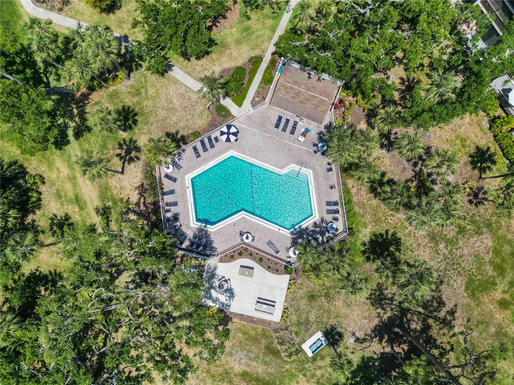 672 White Pine Tree Road, Unit 57 Venice, FL 34285 - Photo 54 of 57 an aerial view of a house with outdoor space and street view