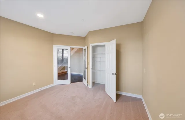 an empty room with closet